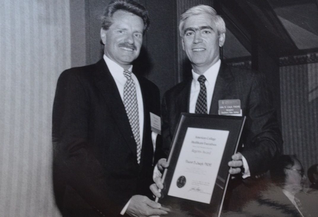 Vincent Joseph and John K. Lloyd, both of Meridian Health, celebrate an award at the NJHA Annual Meeting.