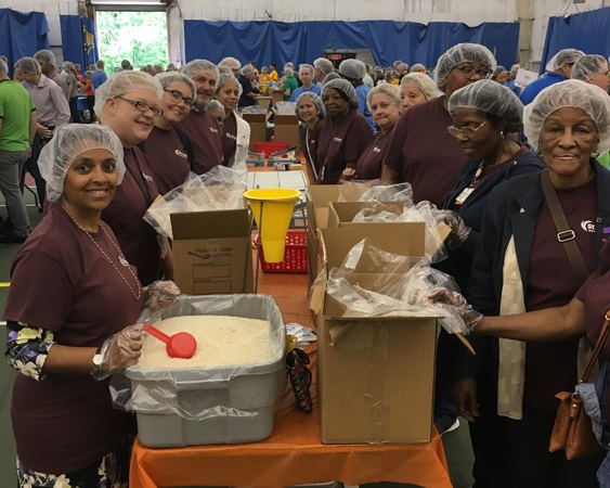 St. Francis Medical Center staff packing food.