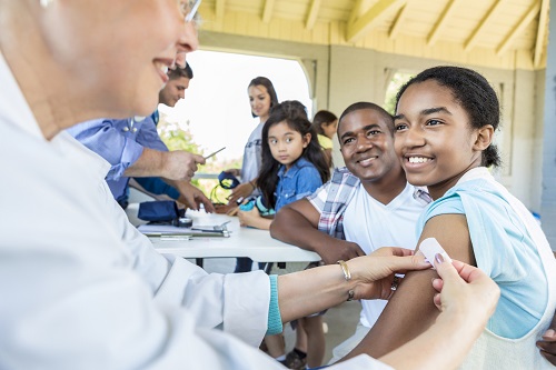 Child receiving a shot.