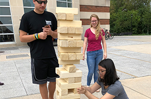Students playing Jenga.