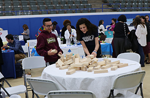 Students playing Jenga.