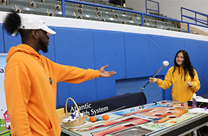 Students playing Operation board game.